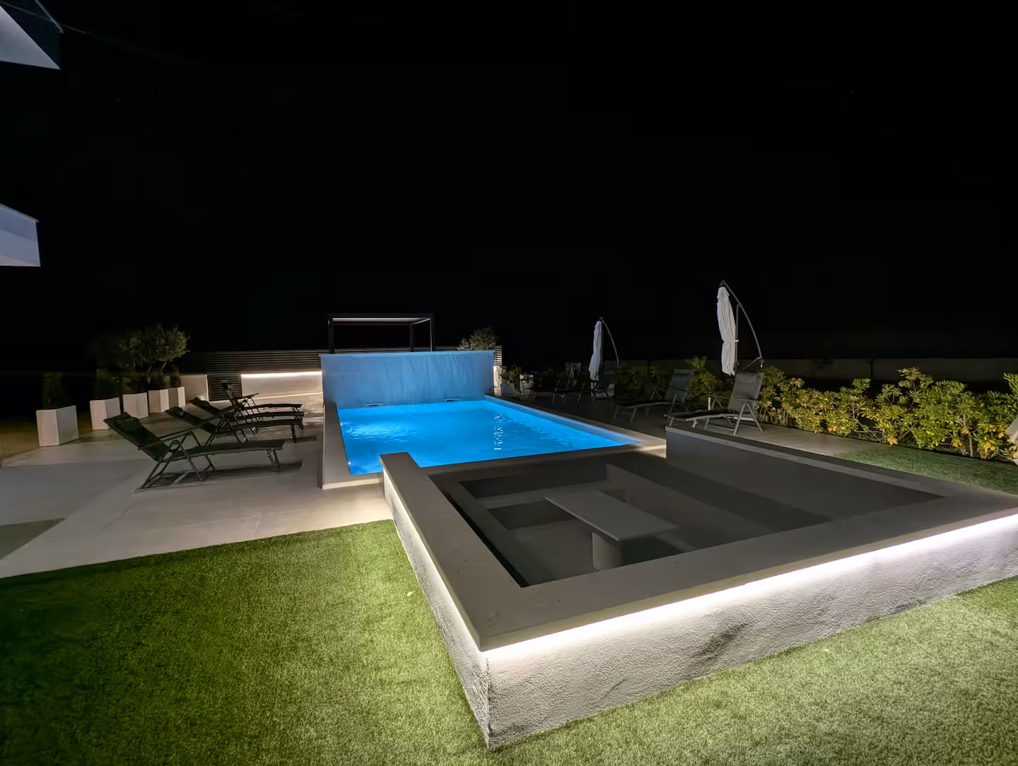 The Luxe Hideaway pergola at night